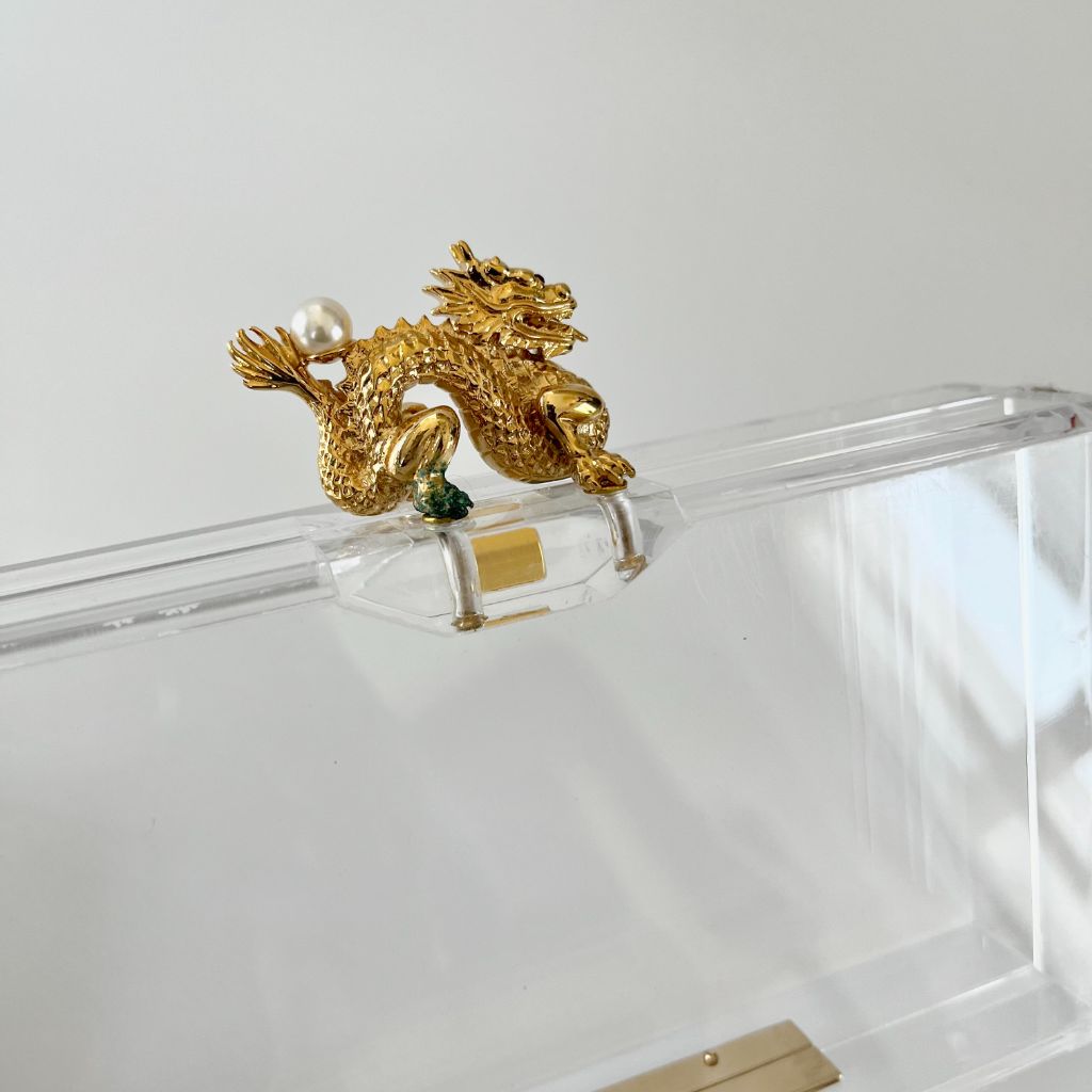 Charlotte Olympia clear plexi clutch with dragon lock