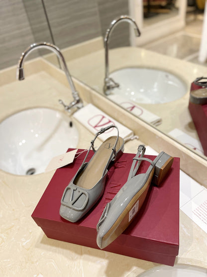 VLOGO GREY PATENT LEATHER SLINGBACK FLATS