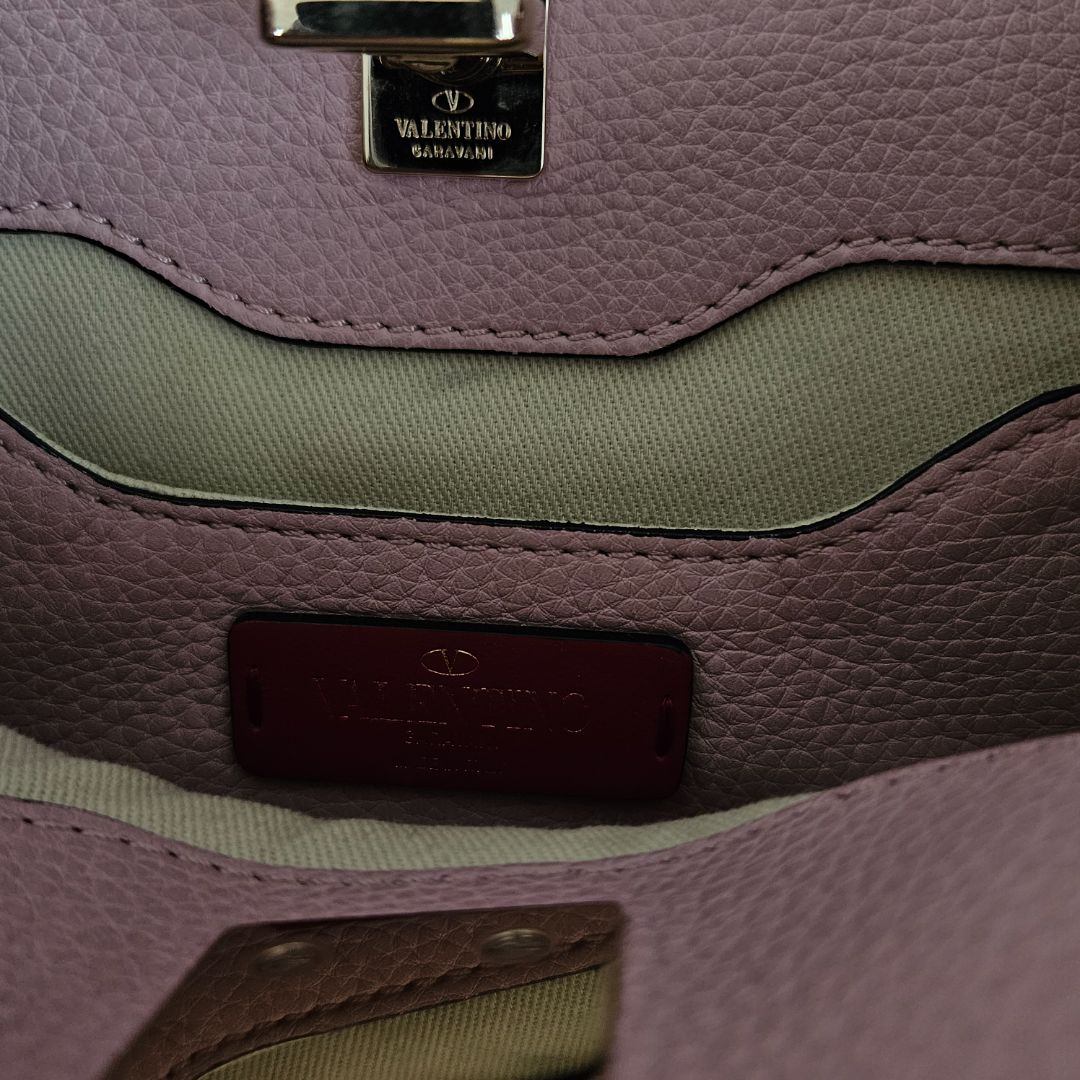 Valentino pink textured leather crossbody flap bag with lock