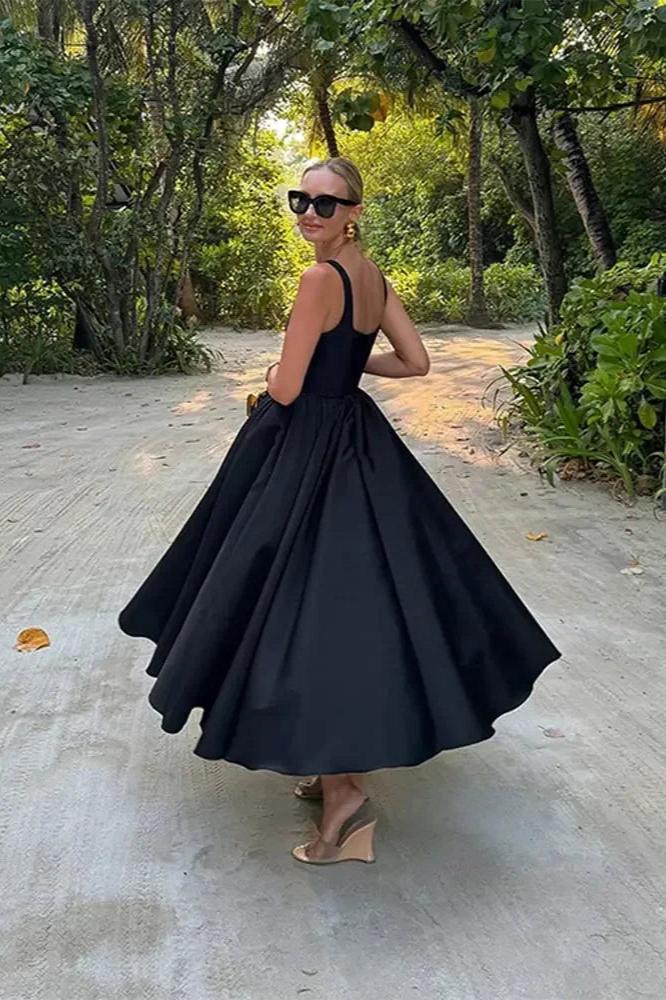 Off Shoulder Black Dress With Flowing Skirt