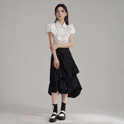 Pleated Lotus Hem Skirt