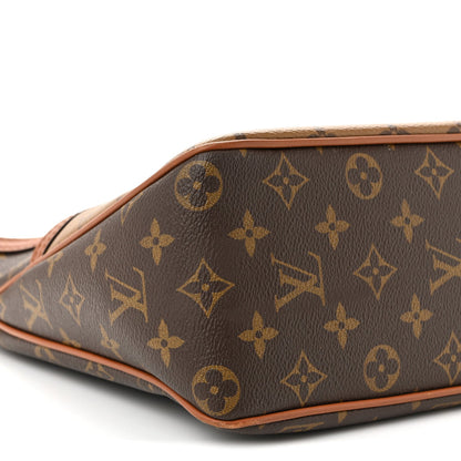 Reverse Monogram Dauphine Hobo PM