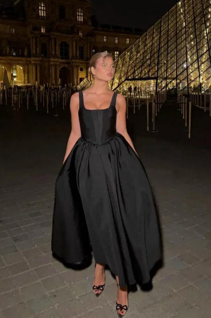 Off Shoulder Black Dress With Flowing Skirt