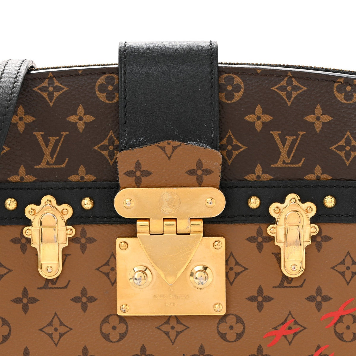 Reverse Monogram Trunk Clutch