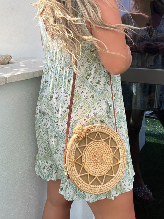 Round Rattan Bag With Sunburst Pattern