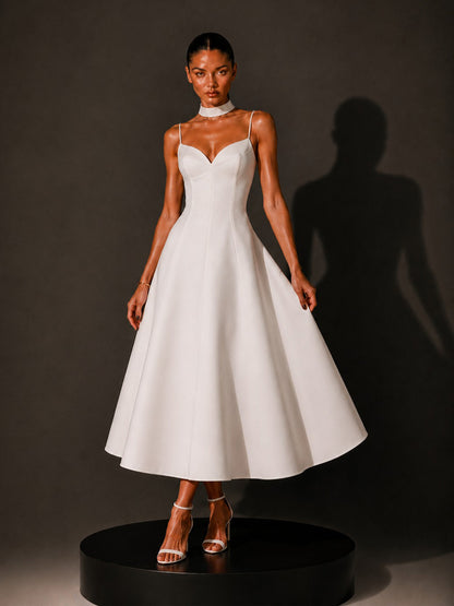 Ruby Retro-Elegant V-Neck Midi Dress In White