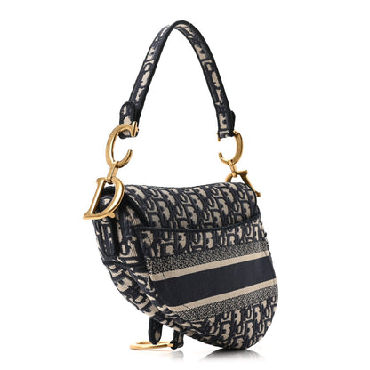 Oblique Embroidered Saddle Bag Blue