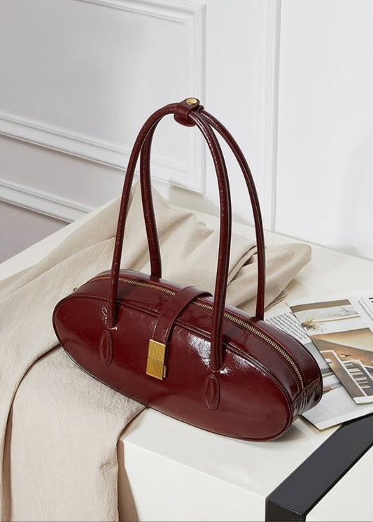 Oval Patent Leather Top Handle Structured Handbag