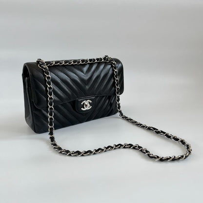 Chanel black chevron quilted leather double flap bag