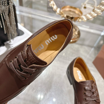 Miu Distressed Loafers Brown Cowhide 592058