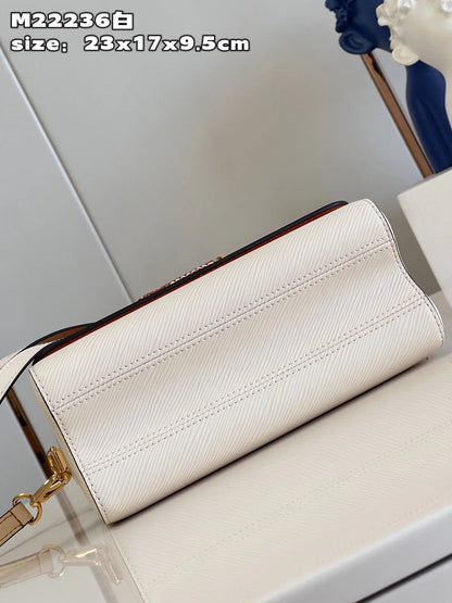 Louis Vuitton Twist MM Epi Bag White Quartz - 23 x 17 x 9.5 cm