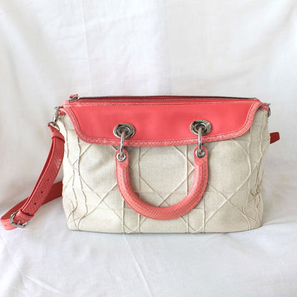 Christian Dior beige canvas with pink python leather trim,