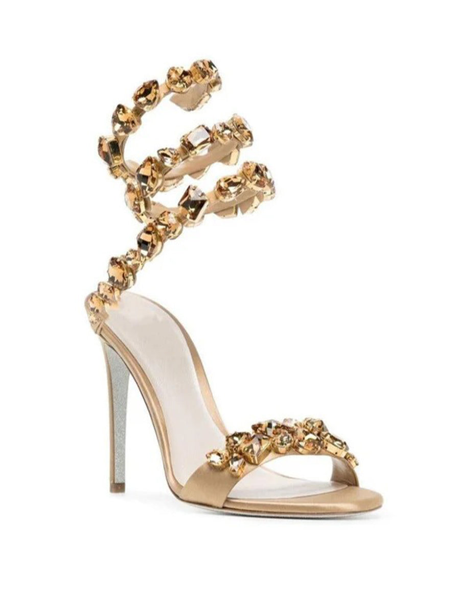 Elyra Snake Rhinestone Sandals In Gold