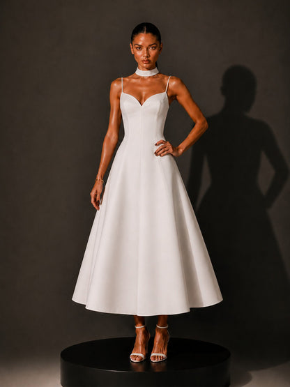 Ruby Retro-Elegant V-Neck Midi Dress In White