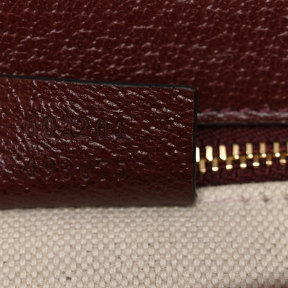 Monogram Textured Dollar Calfskin Horsebit 1955 Shoulder Bag Sahara Rubino Chardonnay