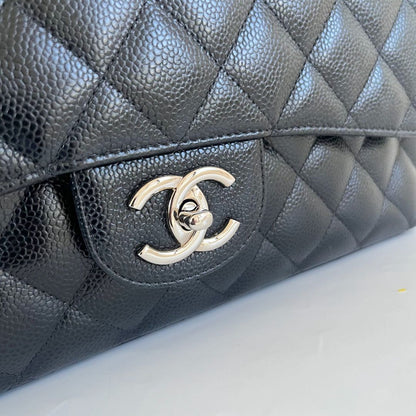 Chanel Black Maxi Classic Caviar Double Flap