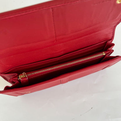 Christian Louboutin red leather bow flap long wallet