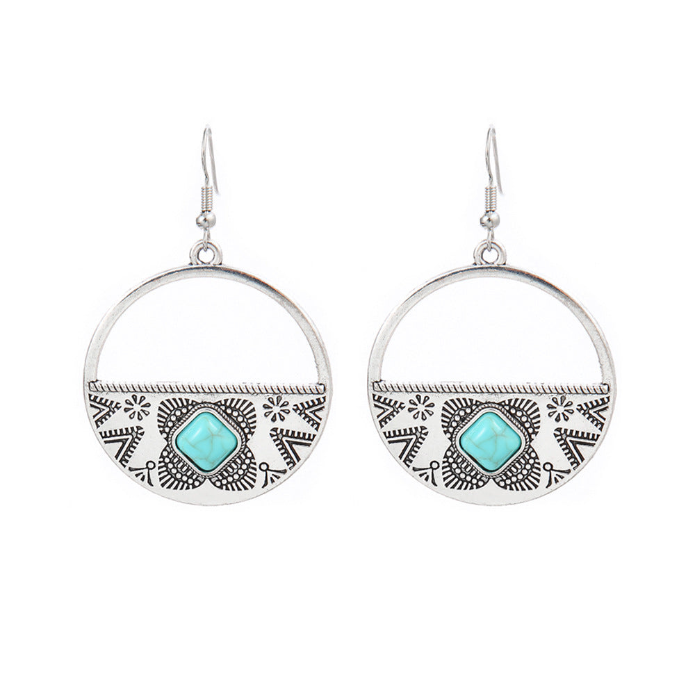 Turquoise Tassel Earrings with Geometric Metal Design