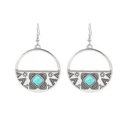 Turquoise Tassel Earrings with Geometric Metal Design