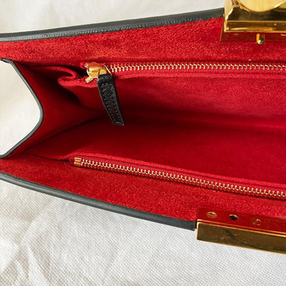 Alexander Mcqueen Skull Four-Ring Clutch Bag
