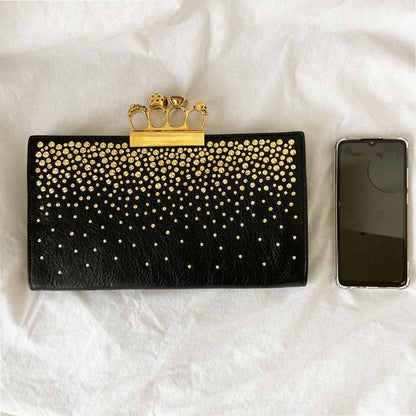 Alexander Mcqueen Skull Four-Ring Clutch Bag