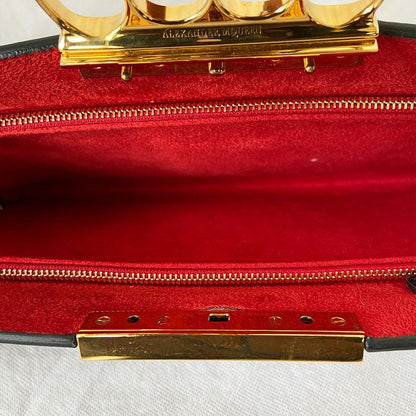 Alexander Mcqueen Skull Four-Ring Clutch Bag