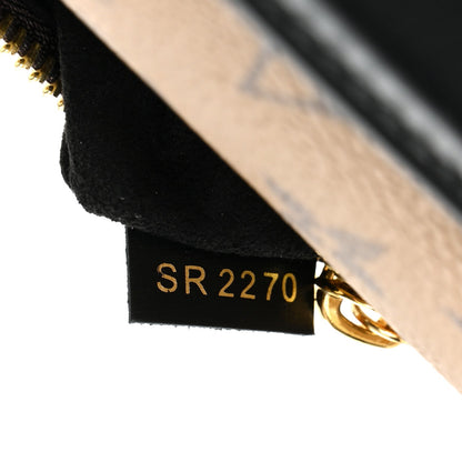 Reverse Monogram Pochette Metis