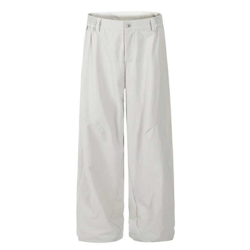 Pleated Curved Hem Wide-Leg Pants Unisex Loose Fit Style