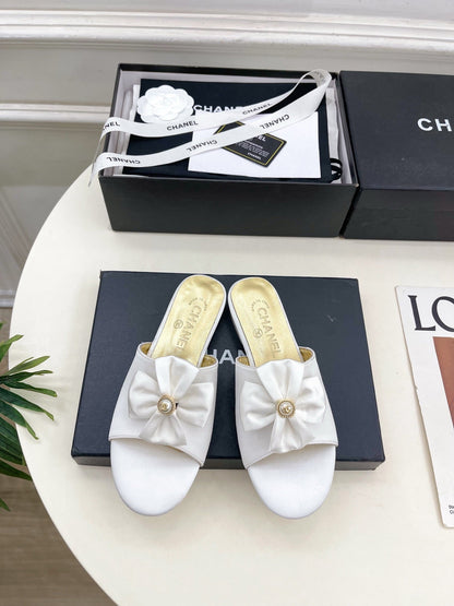 CC 26s Bow Slippers White Satin Sheepskin 586897