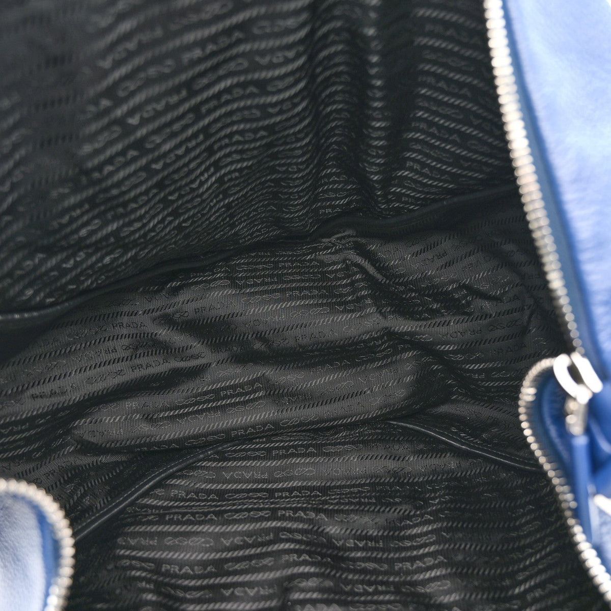 Vitello Daino Triangle Shoulder Bag Blue