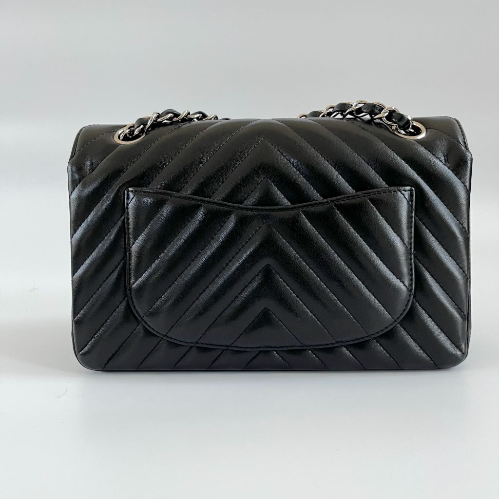 Chanel black chevron quilted leather double flap bag