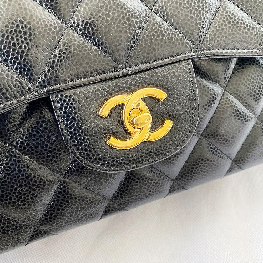Chanel black jumbo caviar classic flap bag