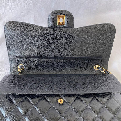 Chanel black jumbo caviar classic flap bag