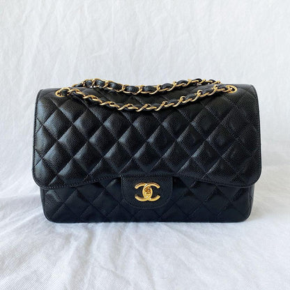 Chanel black jumbo caviar classic flap bag