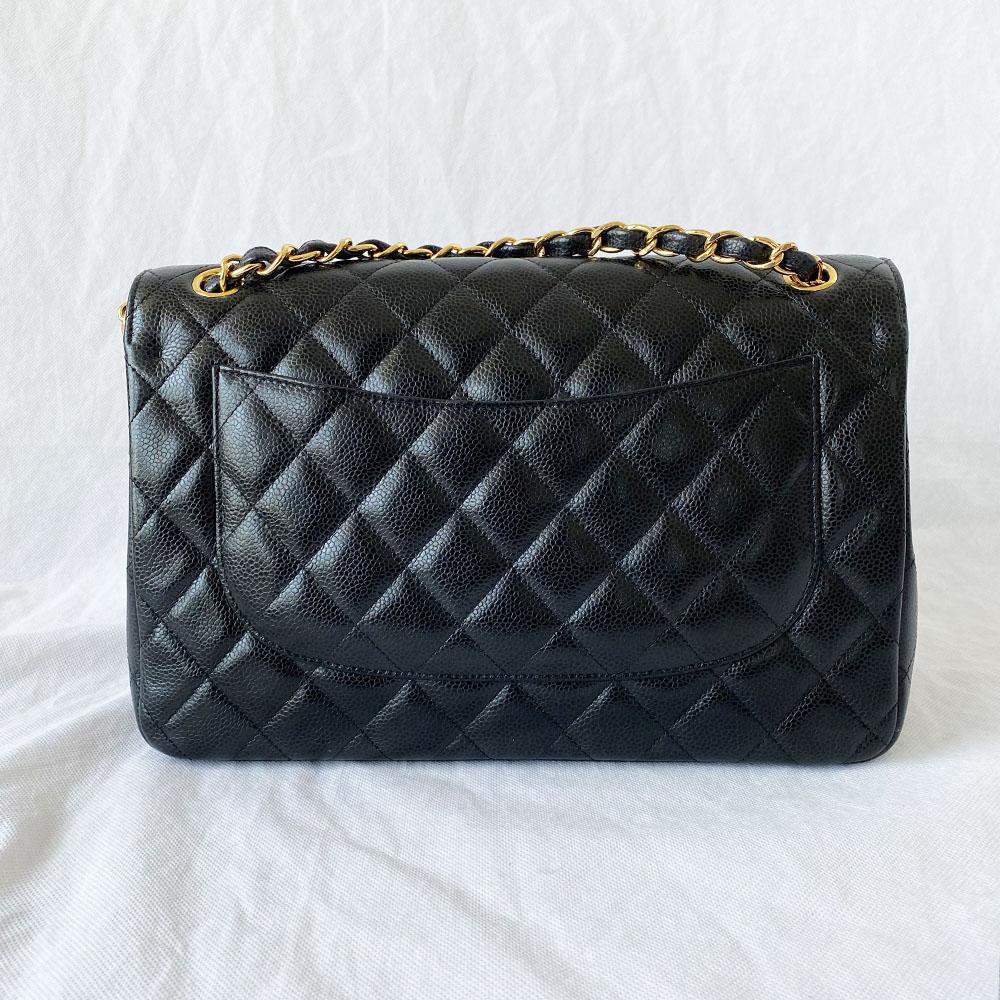 Chanel black jumbo caviar classic flap bag