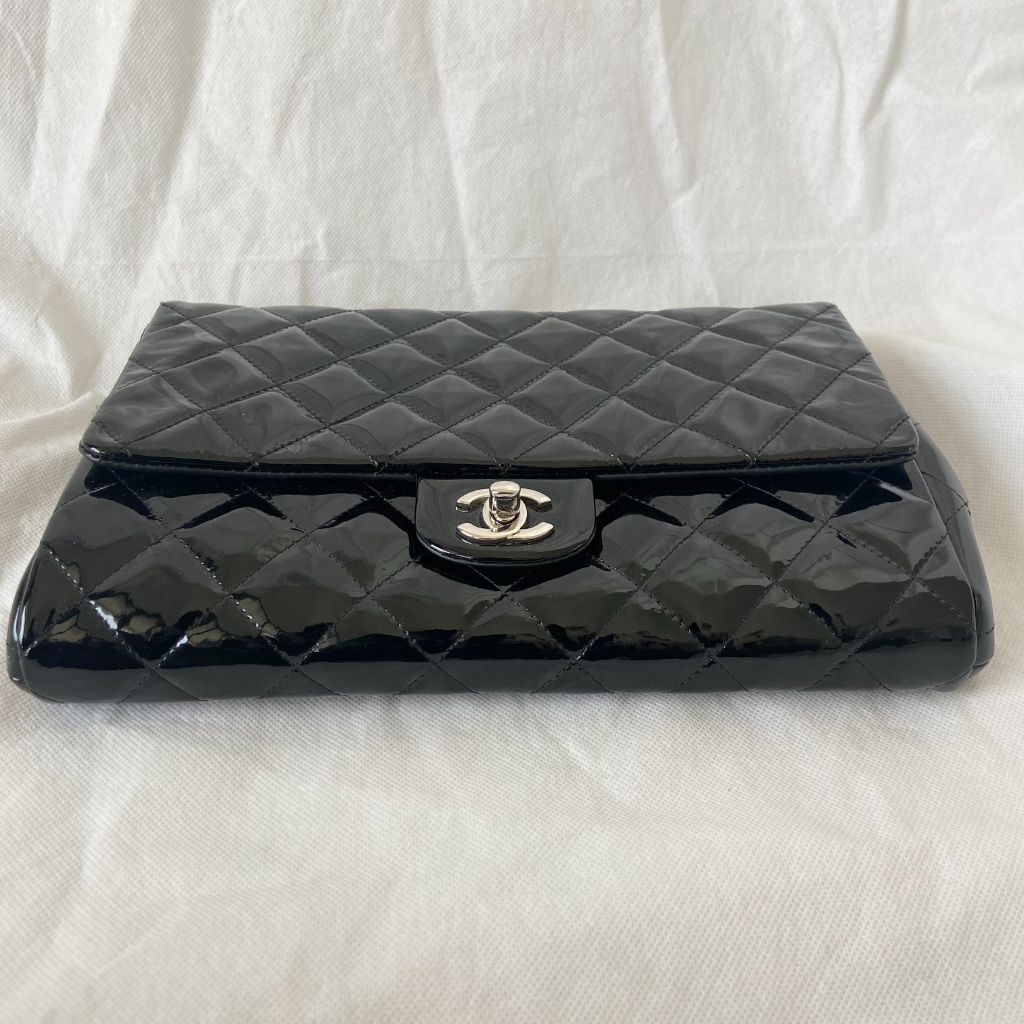 Chanel black quilted patent leather flap bag