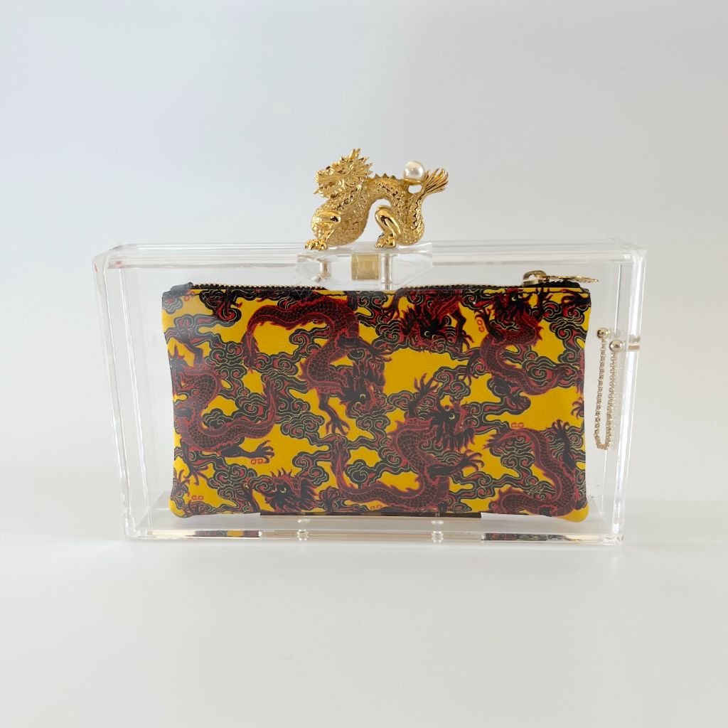 Charlotte Olympia clear plexi clutch with dragon lock
