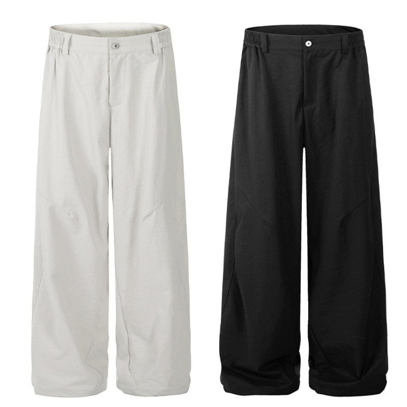 Pleated Curved Hem Wide-Leg Pants Unisex Loose Fit Style