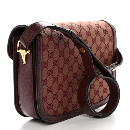 Monogram Textured Dollar Calfskin Horsebit 1955 Shoulder Bag Sahara Rubino Chardonnay