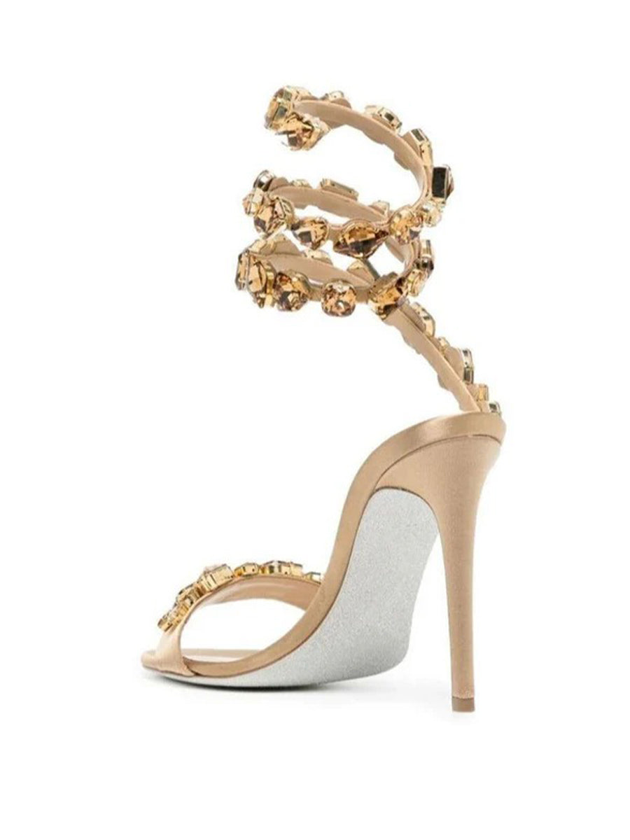 Elyra Snake Rhinestone Sandals In Gold