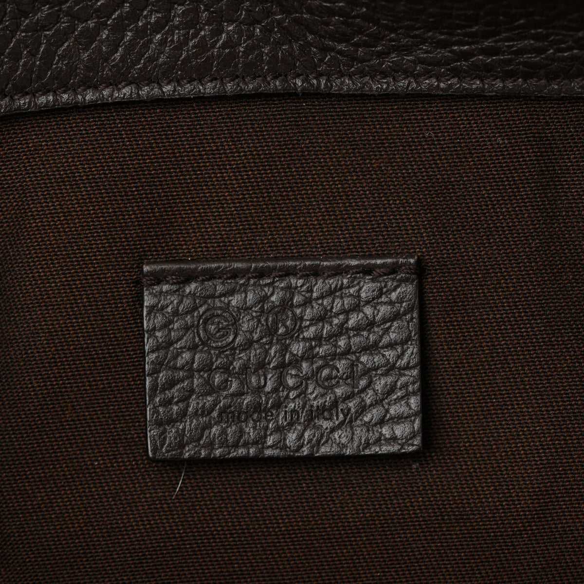 Monogram Dollar Calfskin O Drawstring Backpack Beige Ebony Testa di Moro Dark Chocolate