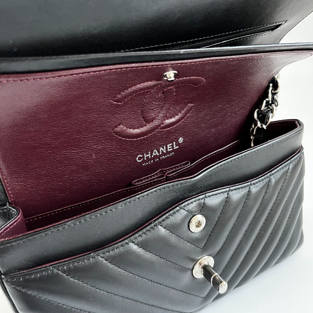 Chanel black chevron quilted leather double flap bag