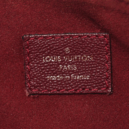 Monogram Pallas Raisin