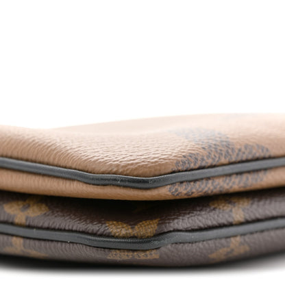 Reverse Monogram Giant Double Zip Pochette