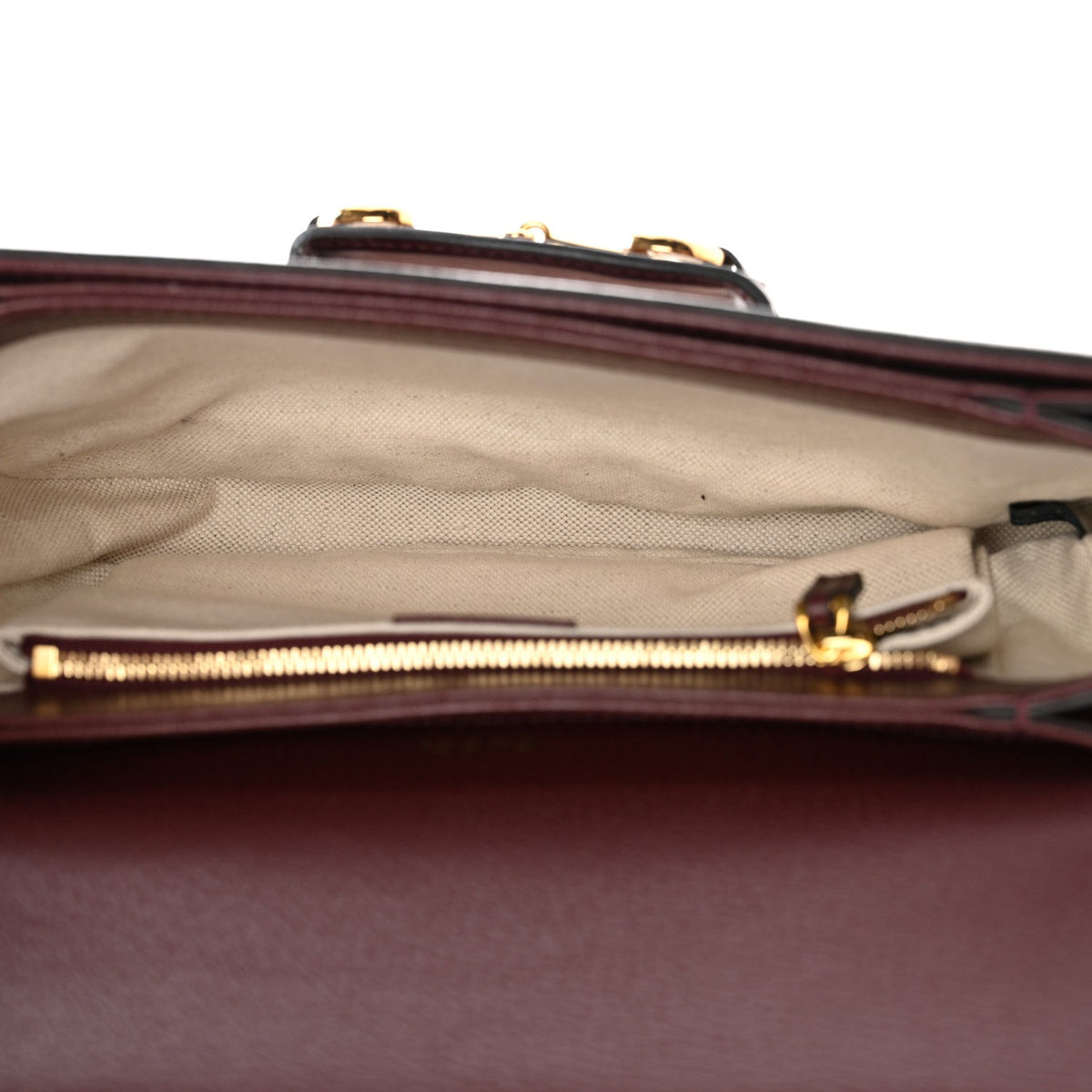 Monogram Textured Dollar Calfskin Horsebit 1955 Shoulder Bag Sahara Rubino Chardonnay