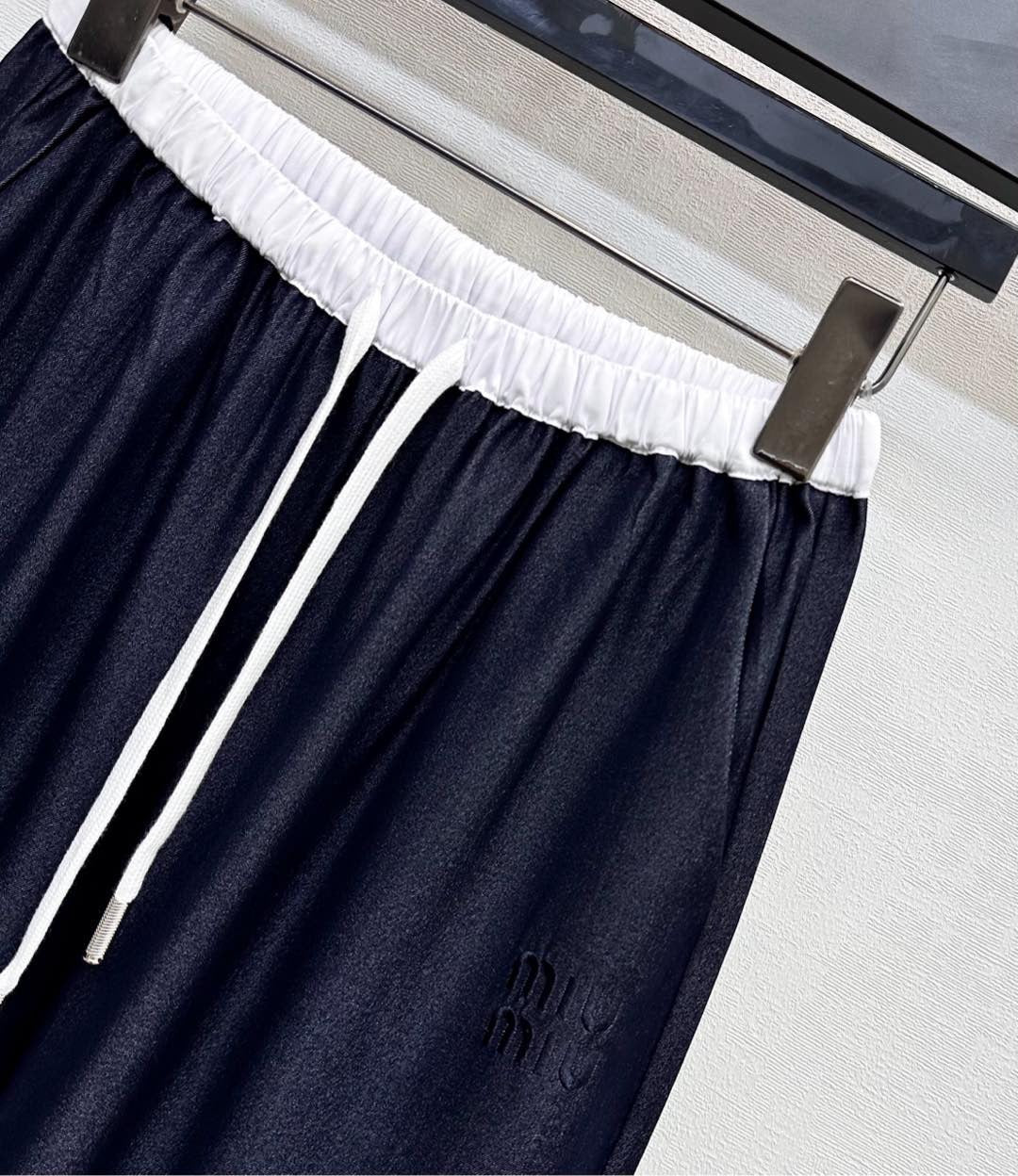 MIU 25S WIDE LEG PANTS WITH DRAWSTRING 264585