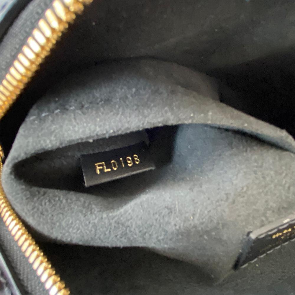 Louis Vuitton City Malle Reverse Monogram Bag