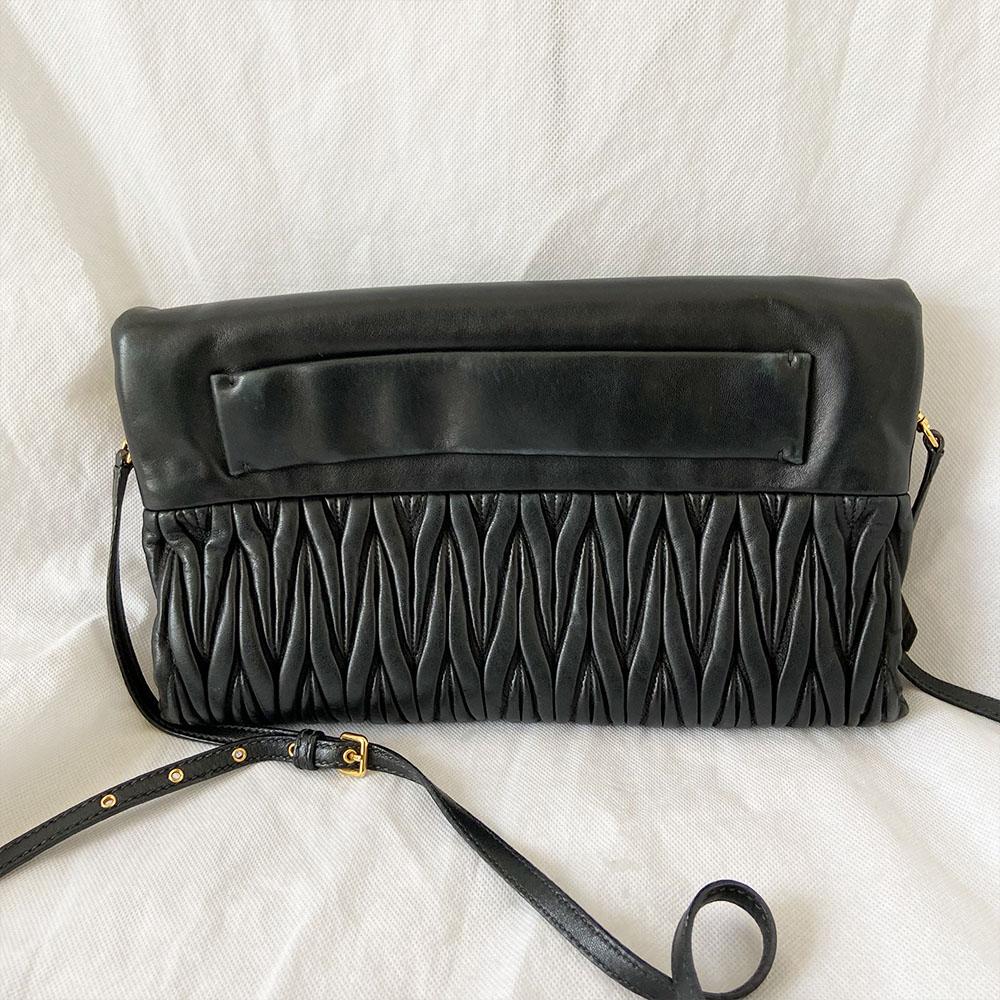 Miu Miu black leather matelasse fold over clutch bag